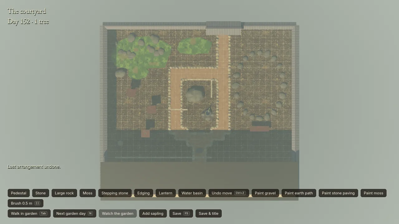 The courtyard plan from above with a large rock, a water basin and runs of kerbs on the half-metre grid.
